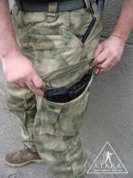 В грузовой карман помещается 2-3 магазина АК серии